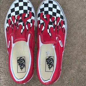 Red flame checkered slip on vans
